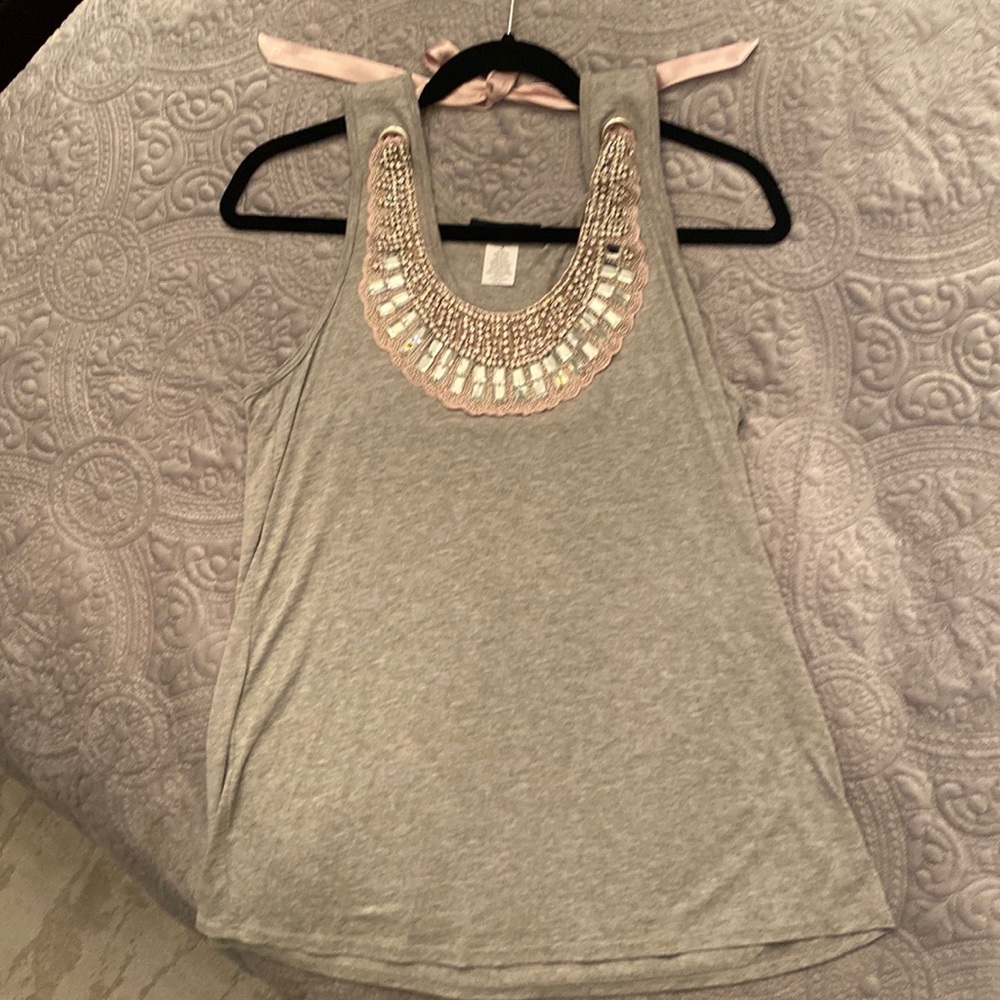 Fancy, sleeveless sexy top, with lots of sprinkle and shine for the holidays.